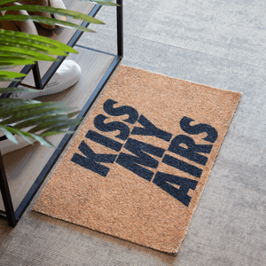 a brown and black mat with words on it