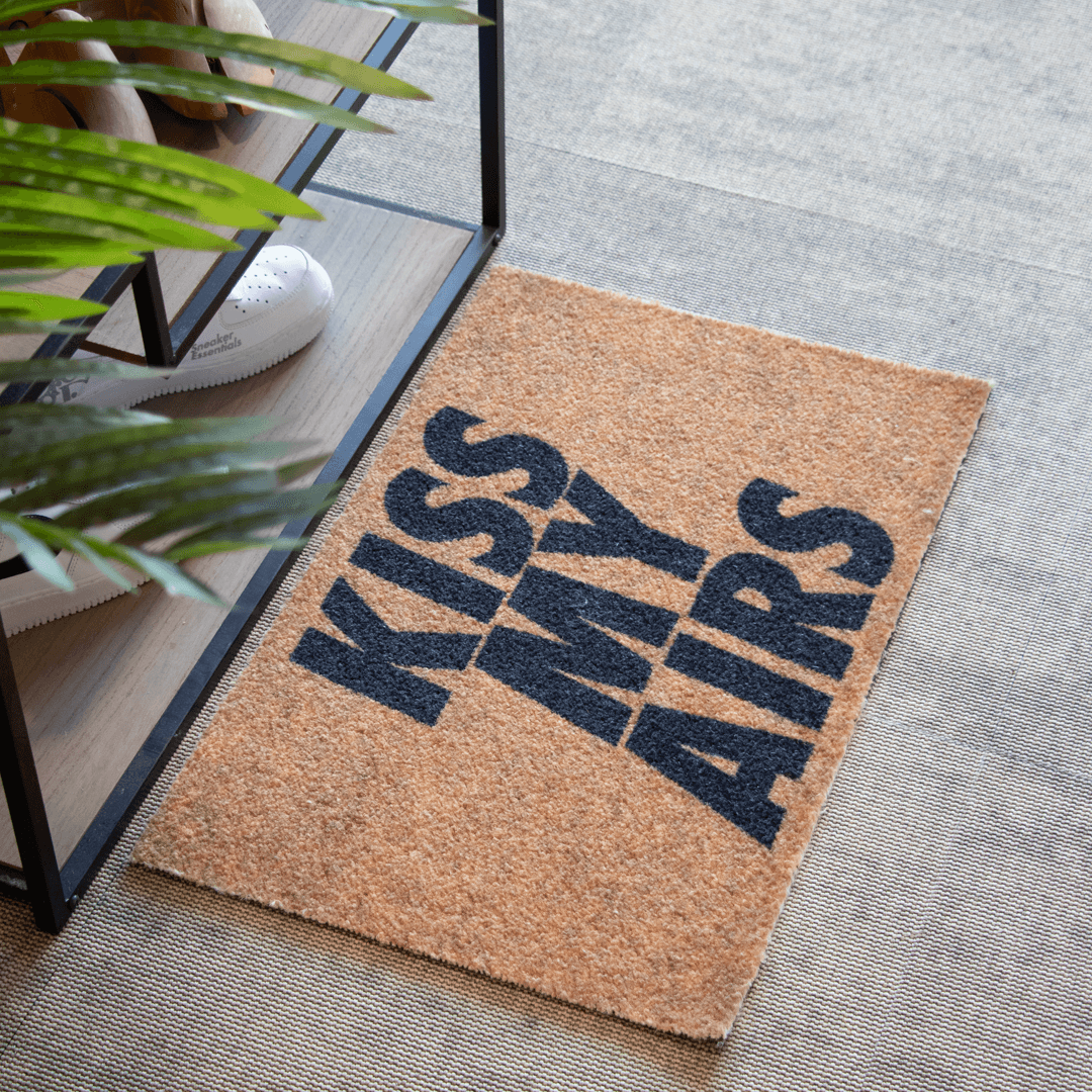 a brown and black mat with words on it